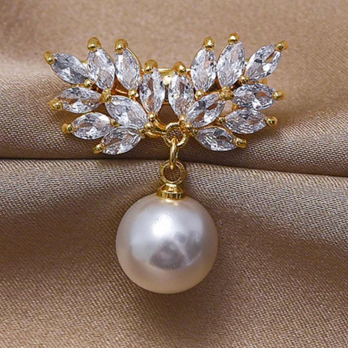 Pony eye brooch