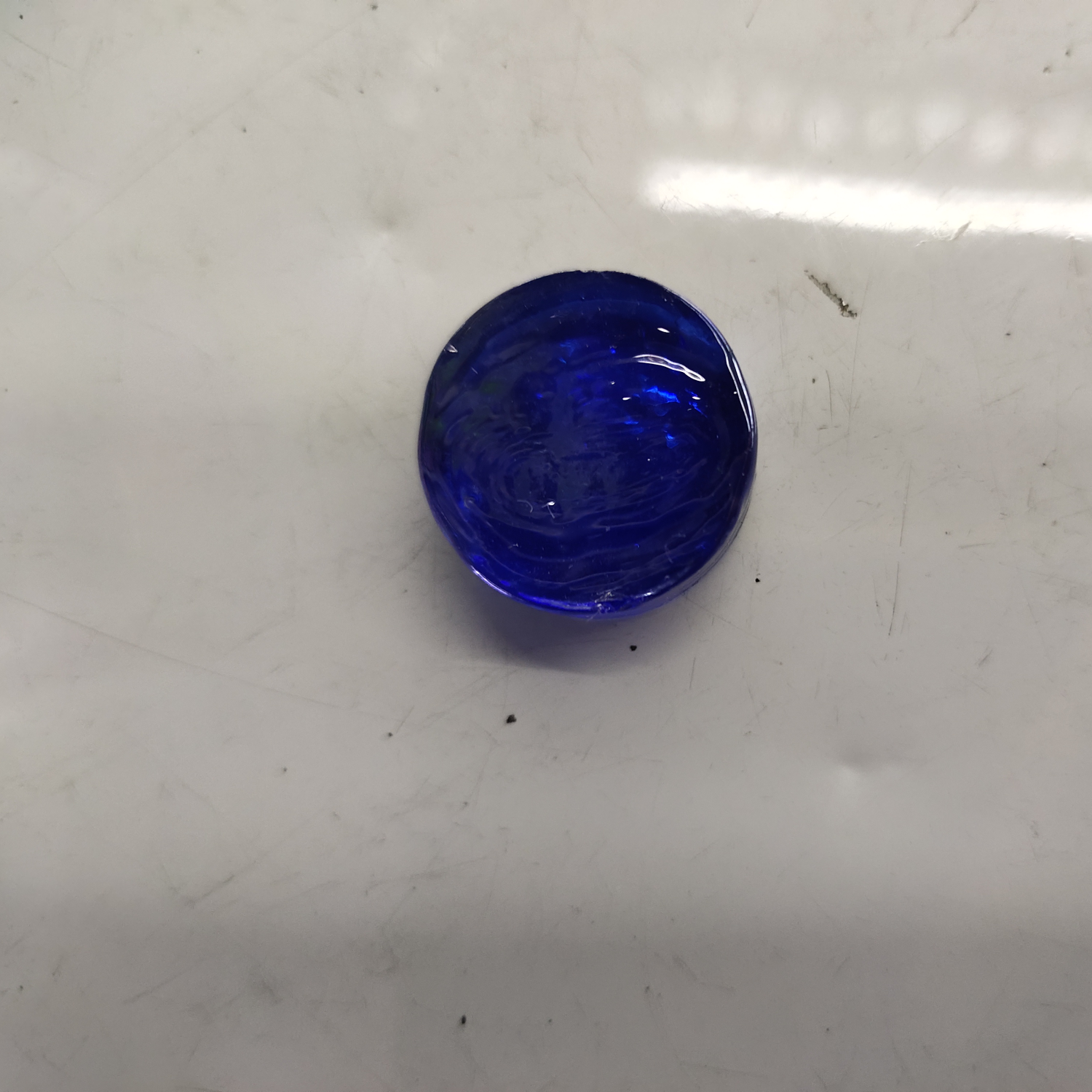 Deep blue round stone