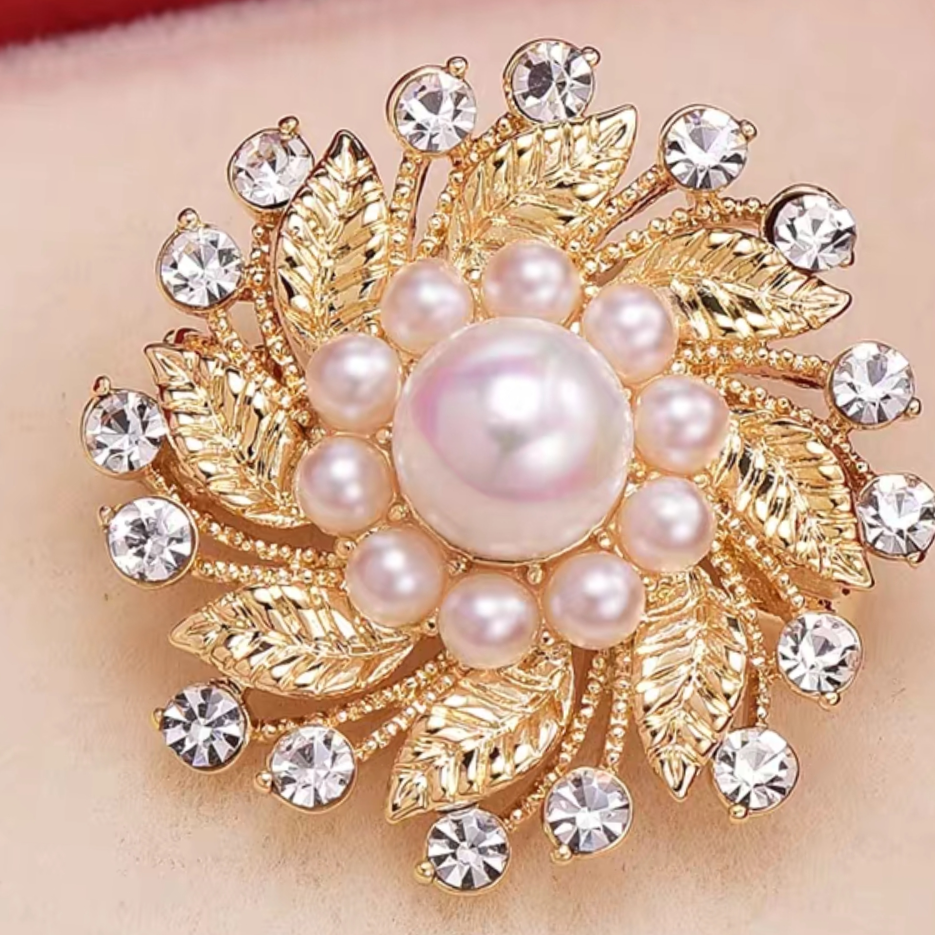 Spiral pearl brooch