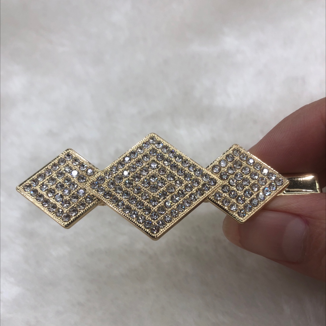 Three diamond-shaped rhinestones with duck side clips