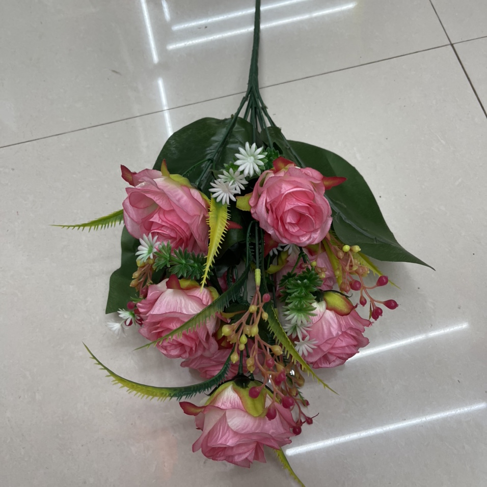 Twelve large roses with leaves