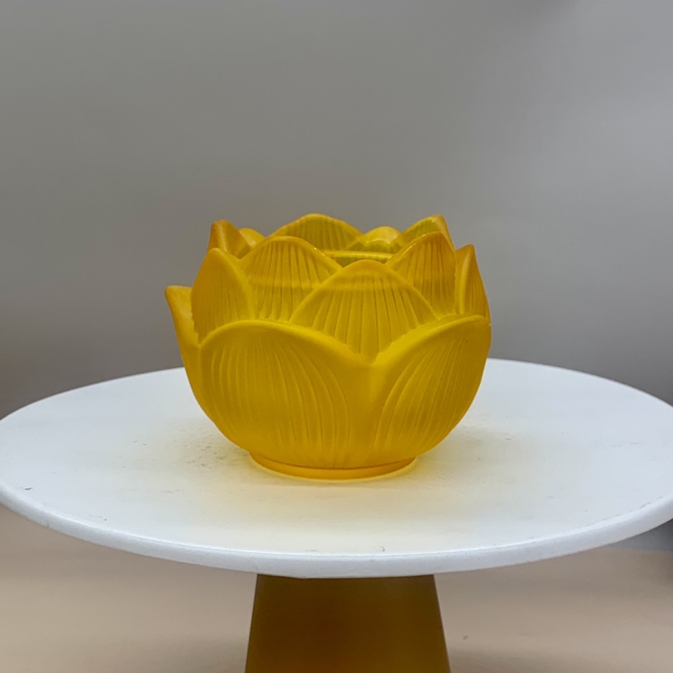 Buddhist candle holder