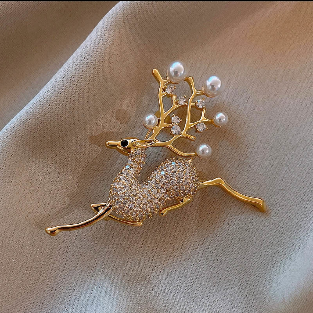 Running deer brooch