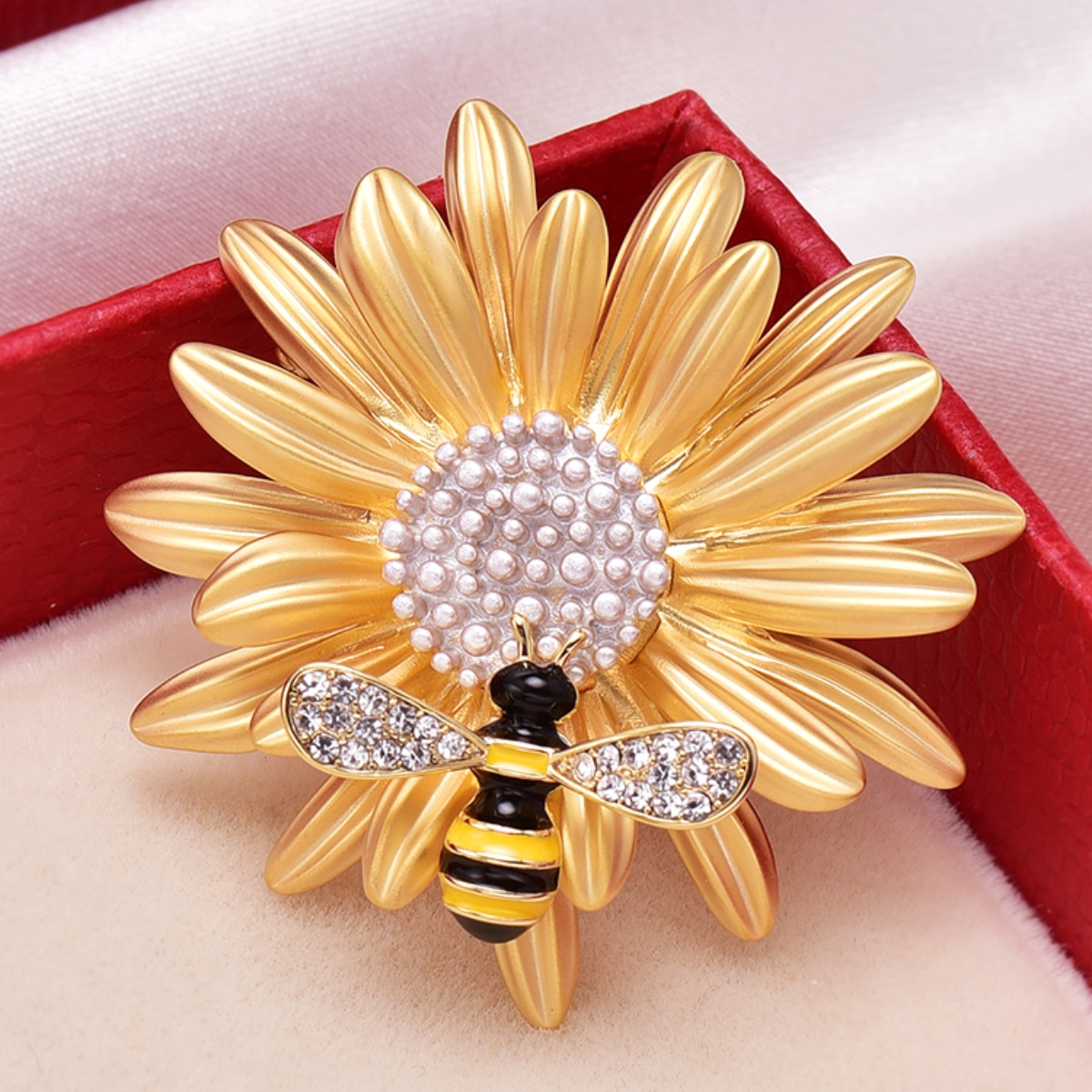 Bees and flower brooches