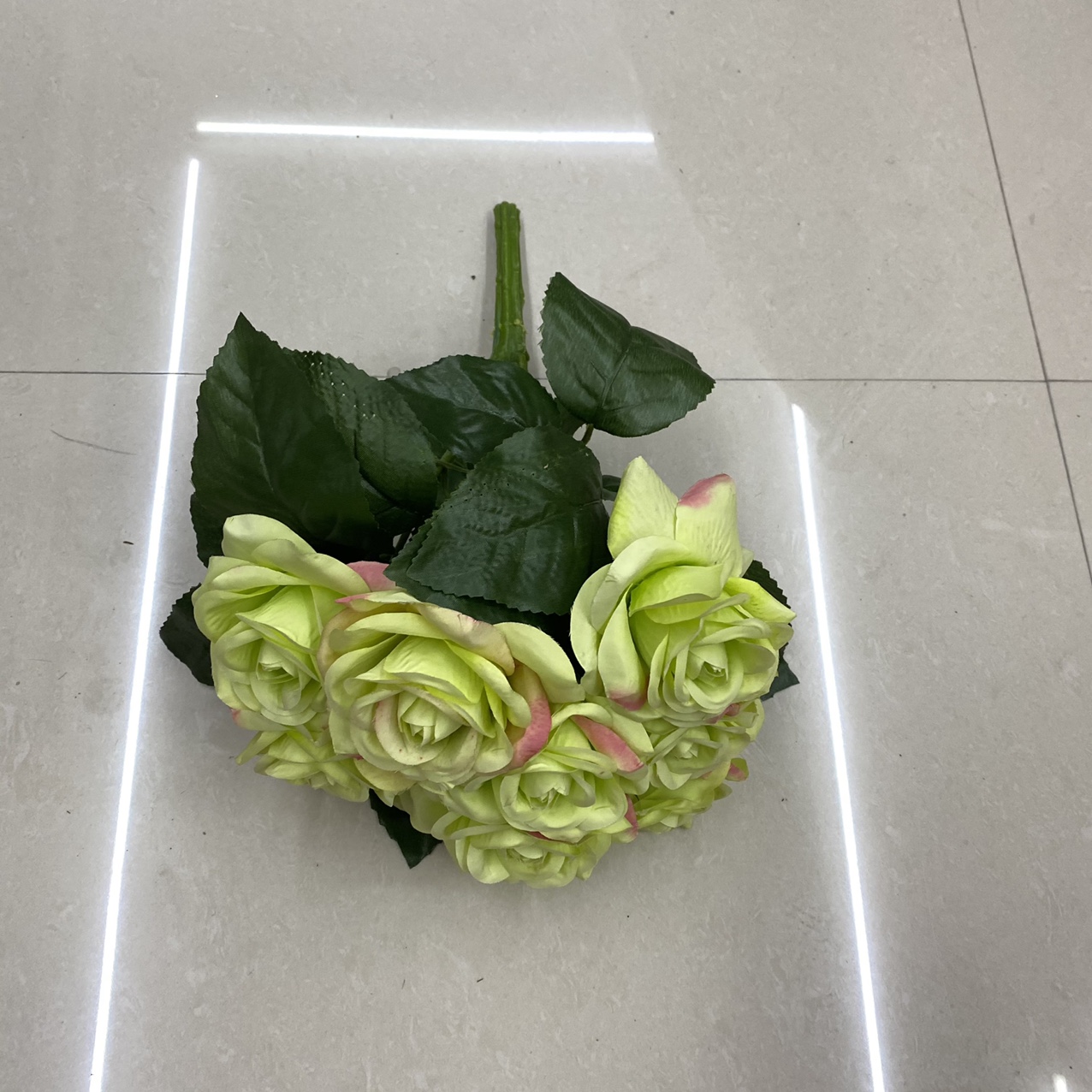 A bouquet of leafy roses