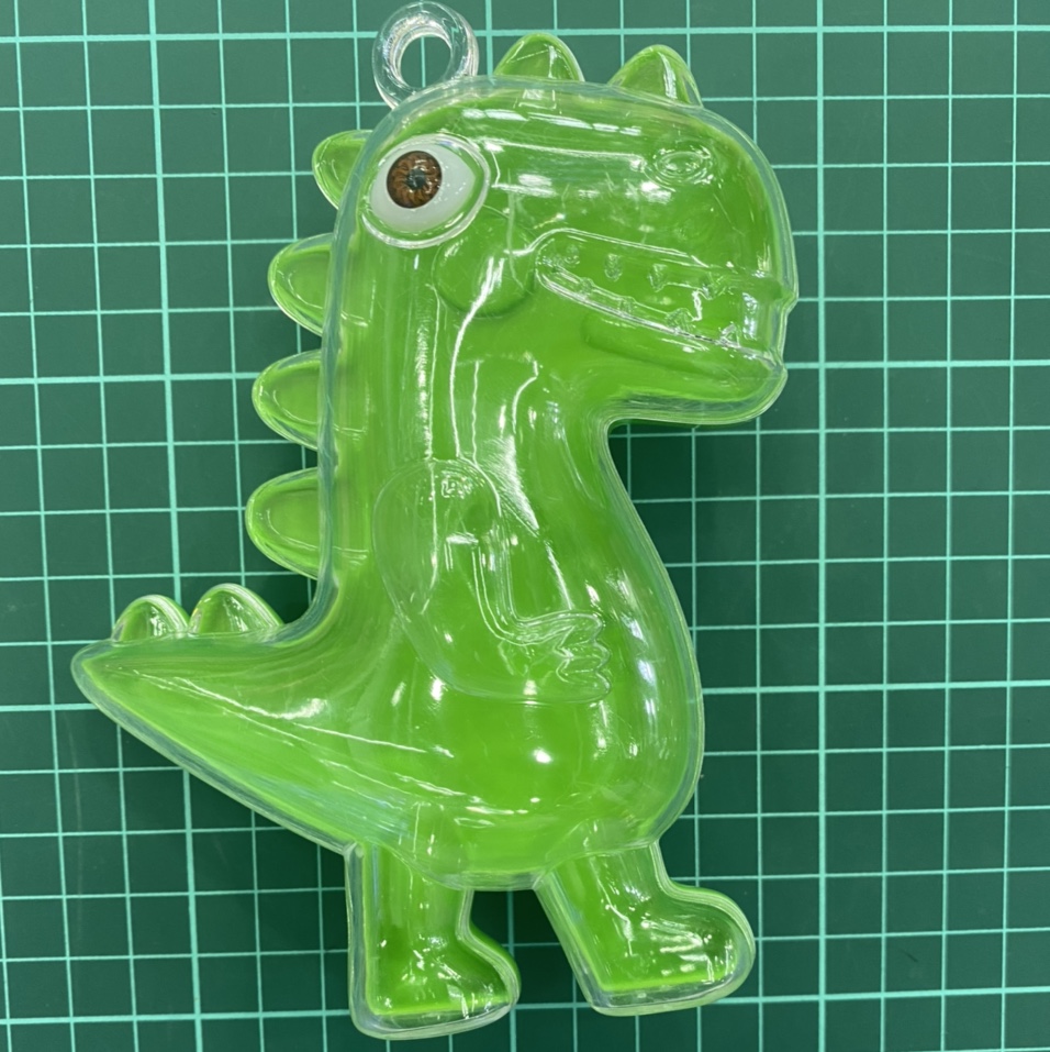 Square storage box light green dinosaur