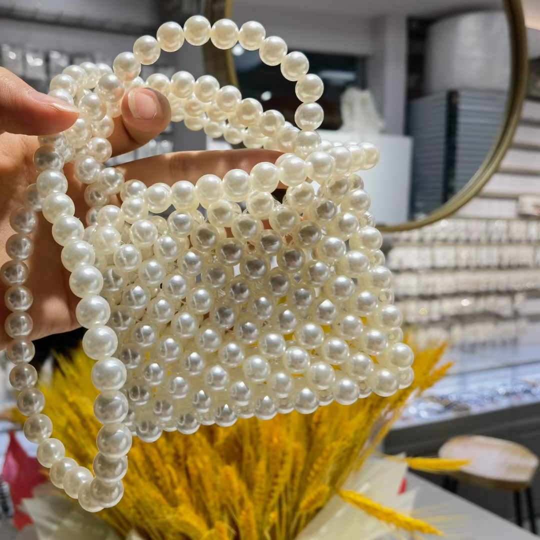 Super popular small women's bag Summer versatile 2021 New trendy pearl crossbody bag, niche design hand-held small square bag 16