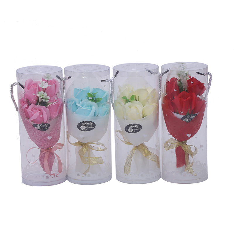 Five blue flowers held in hands details Picture