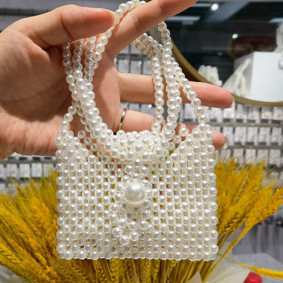 Super popular small women's bags for summer, 2021 new trendy pearl crossbody bag, niche design, hand-held small square bag 20