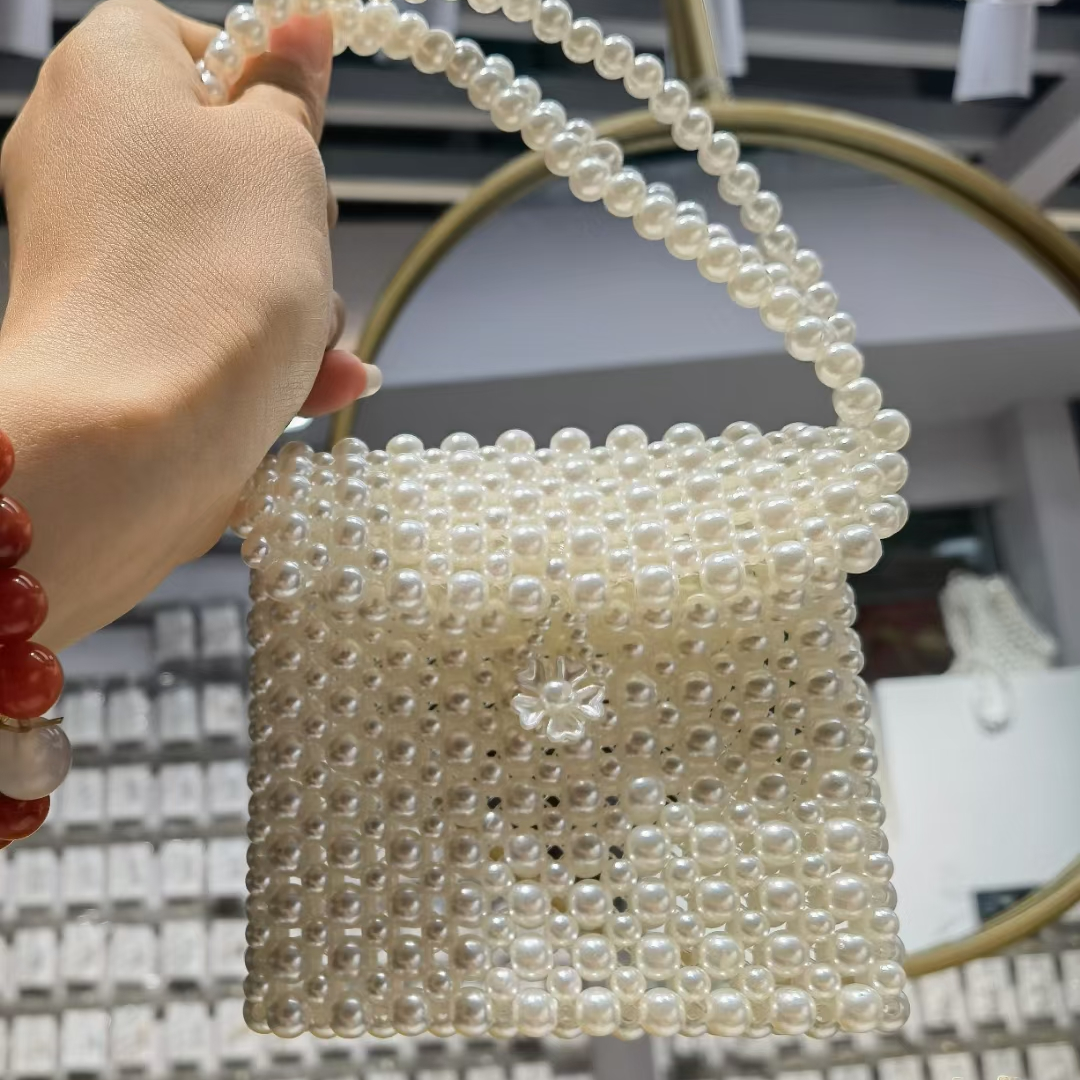 Super popular small women's bag Summer versatile 2021 New trendy pearl crossbody bag, niche design hand-held small square bag 28