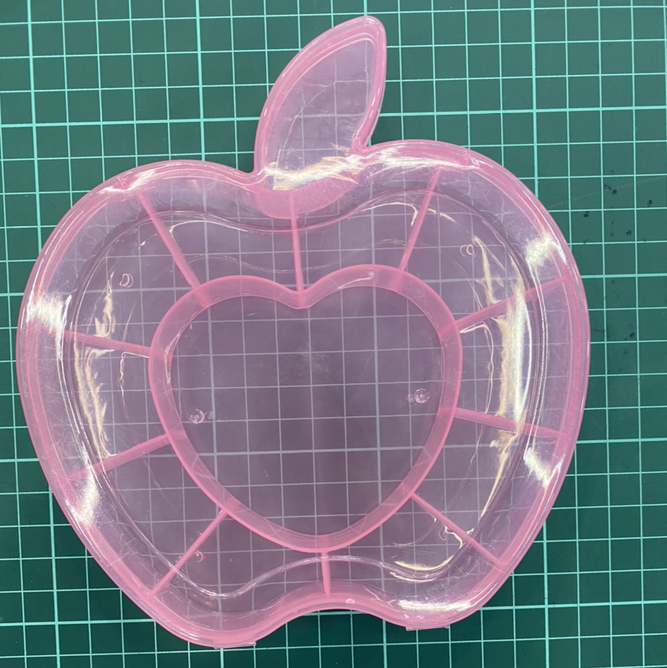 Pink apple in the box