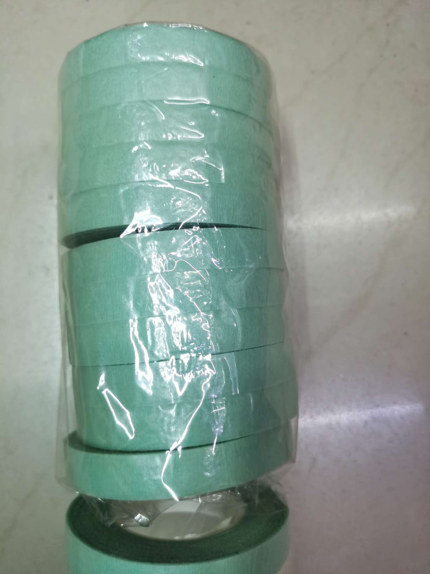 The tape is blue-green. Specification image