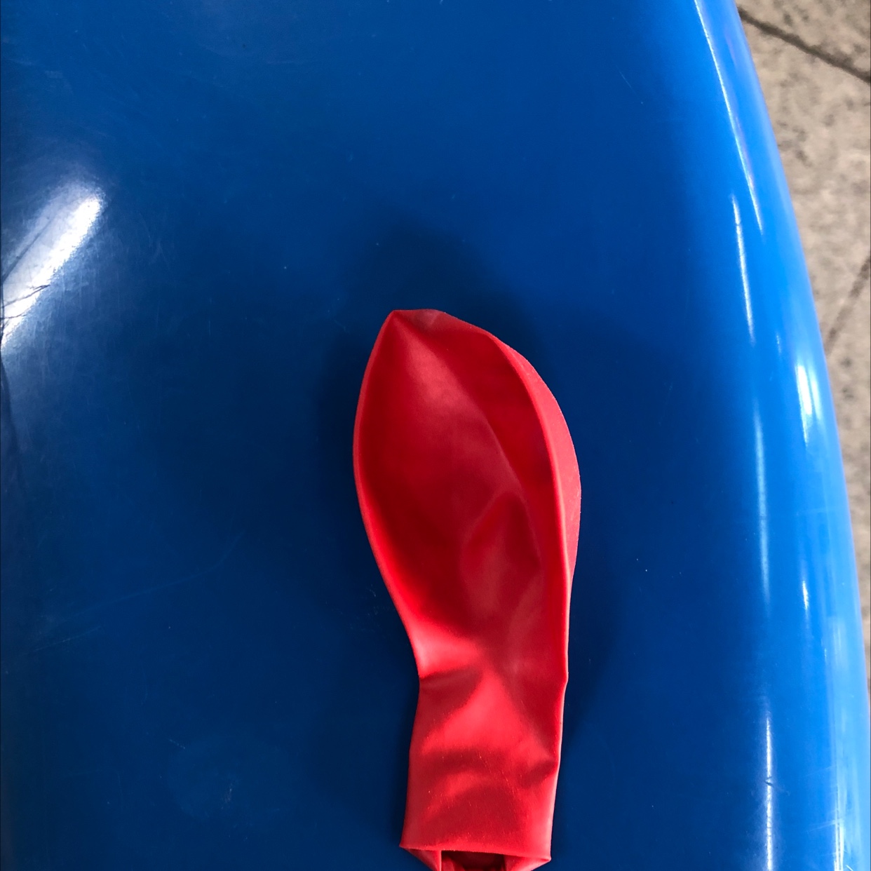 The pearlescent balloon is red