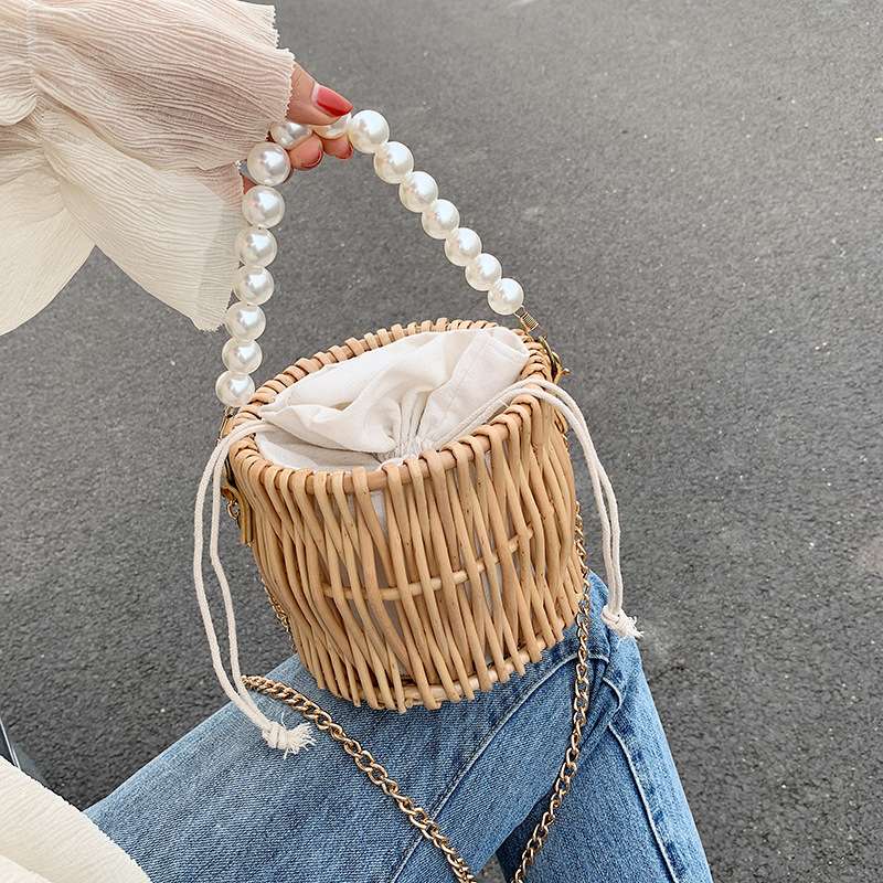 珍珠包包女2020新款纯手工编织手提包ins草编藤编斜挎包网红小包产品图