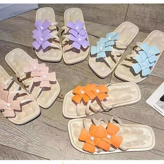 Fashionable two-flower women's flip-flops
