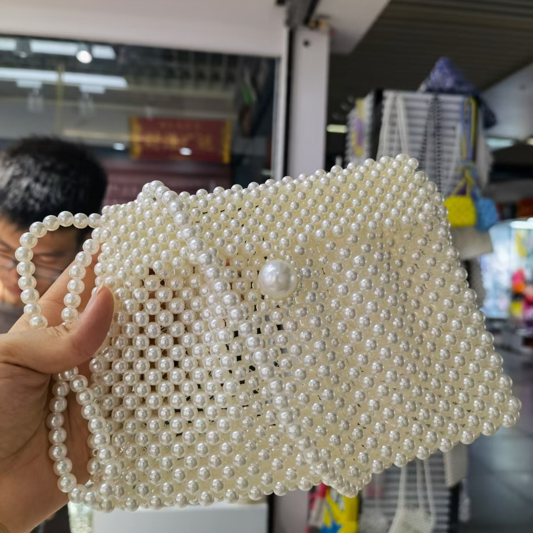 Super popular small women's bag Summer versatile 2021 New trendy pearl crossbody bag, niche design hand-held small square bag 27