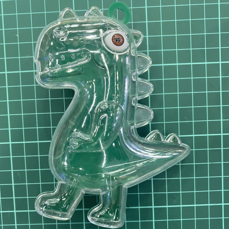 Square storage box dark green dinosaur