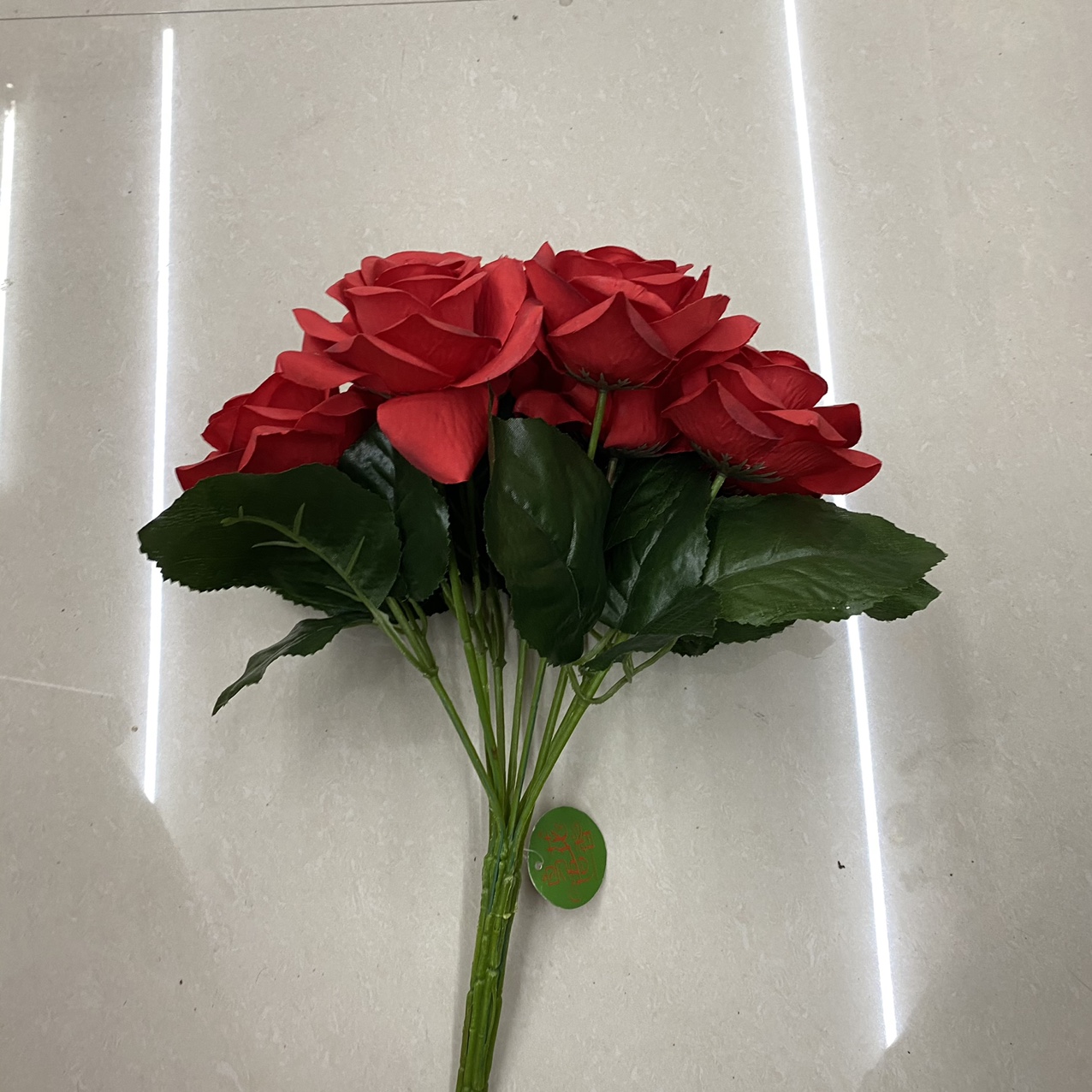 Dark green leaves bright red bunches