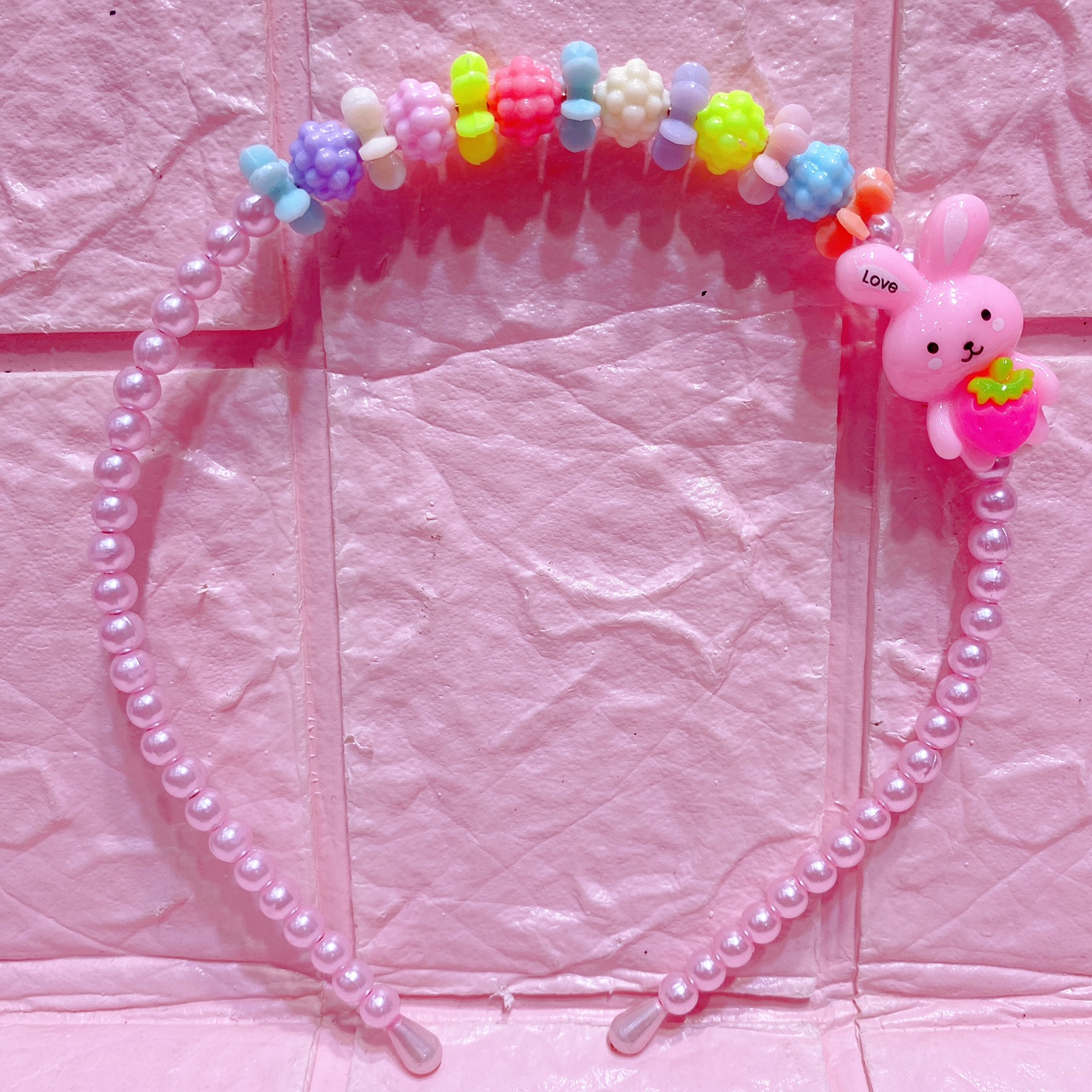 The rabbit head buckle is in AB color