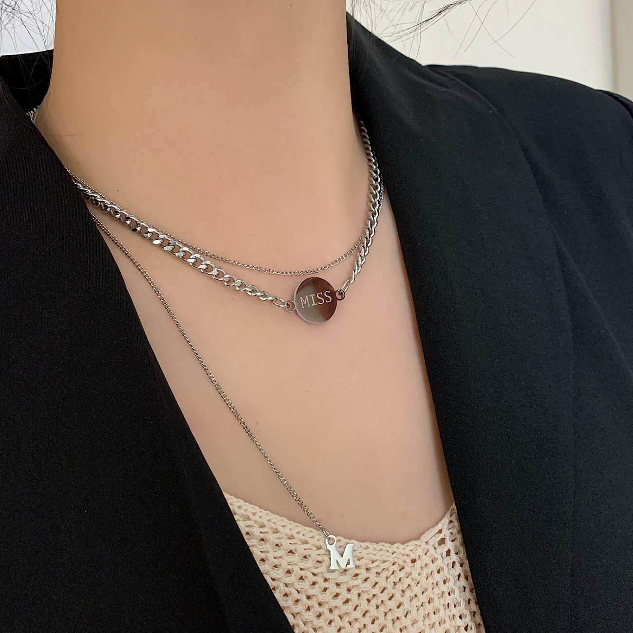 The "Korean and Korean Cold Style" double-layered round plate MISS titanium steel necklace with a niche design sense for both men and women is a trend of popular collarbone chains Application Scenario