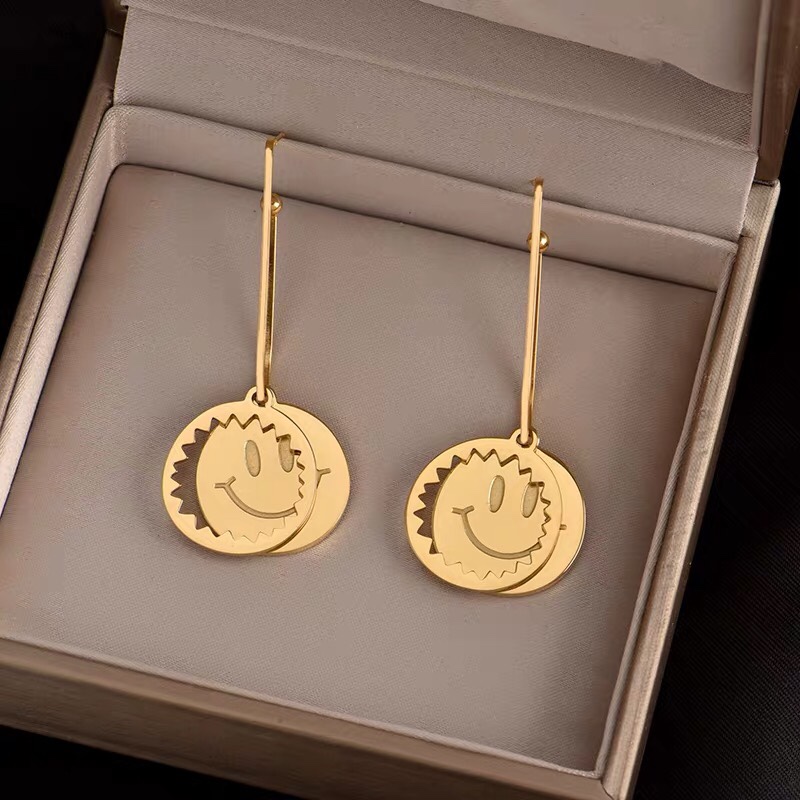 The latest titanium steel earrings feature a unique design and a long smiley face style