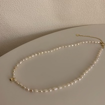 Light luxury natural freshwater pearl necklace female summer niche ins simple small rice chain retro collarbone chain accessories