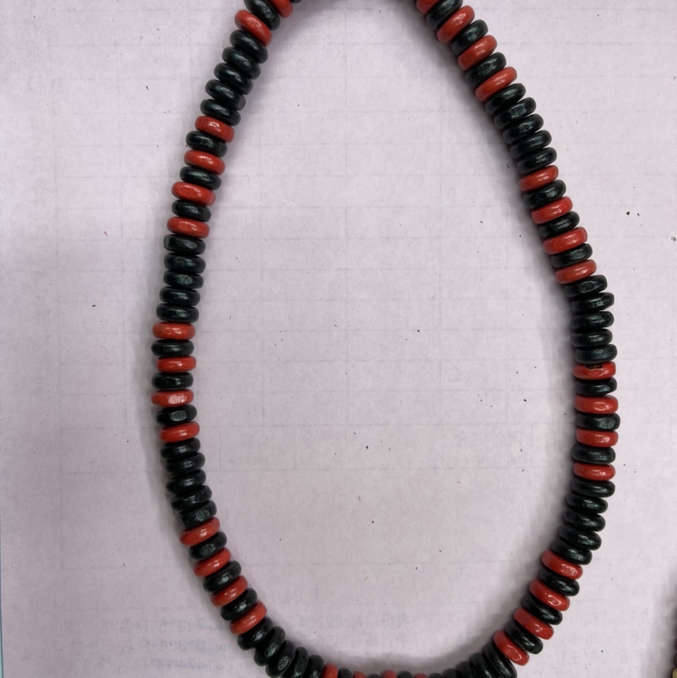 Black ten red necklace