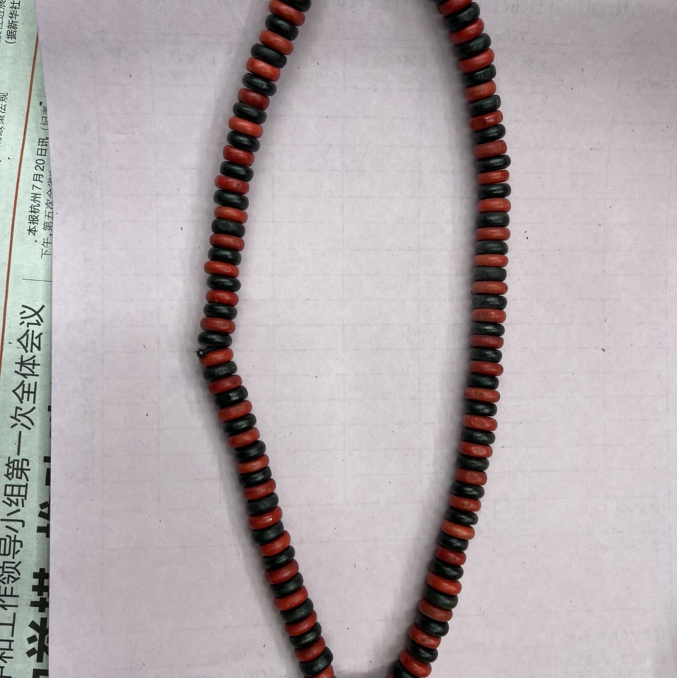 Red ten black necklace