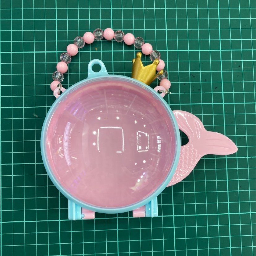 Square box carrying mermaid