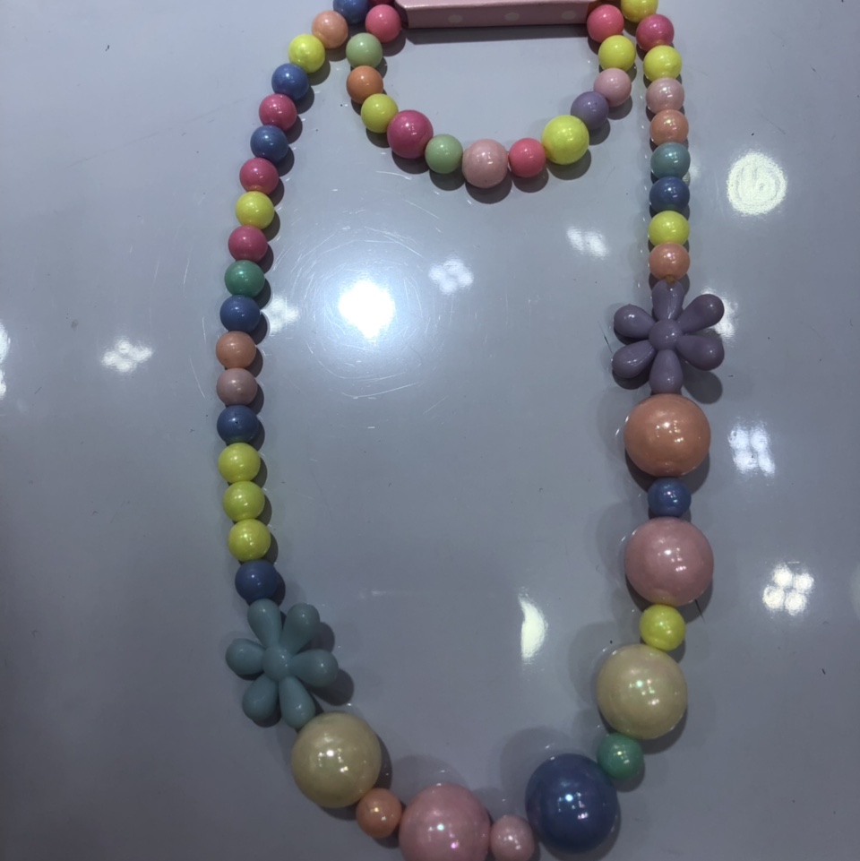 Children's toy necklace paired with bracelet