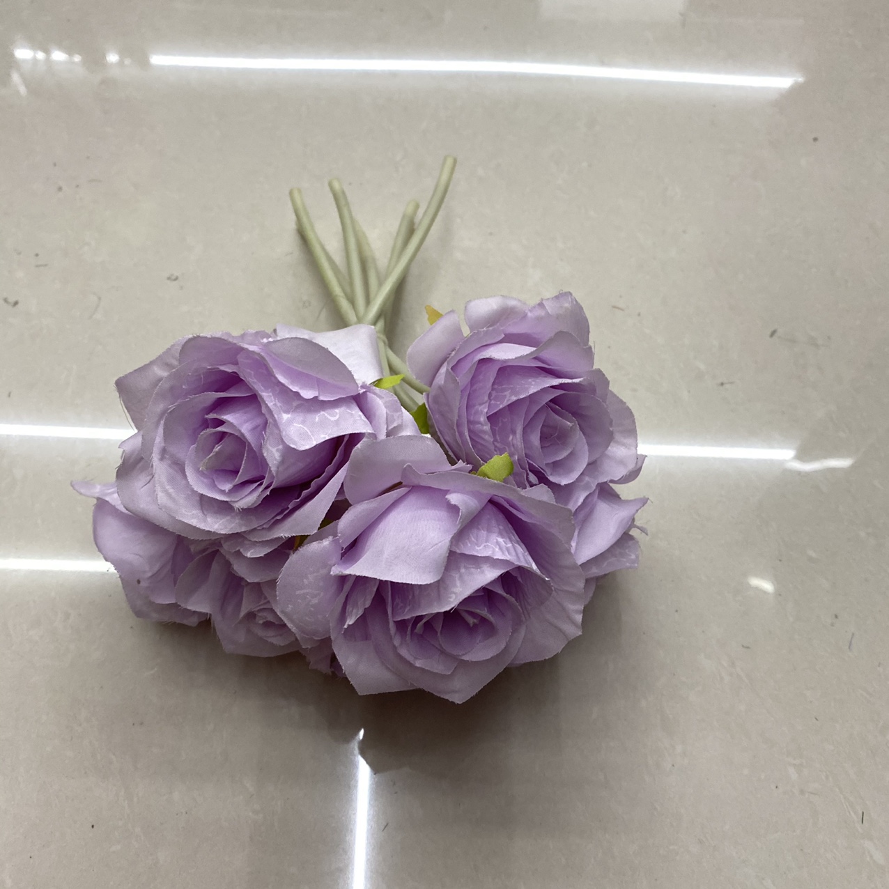 Pale purple snowflake rose bouquet