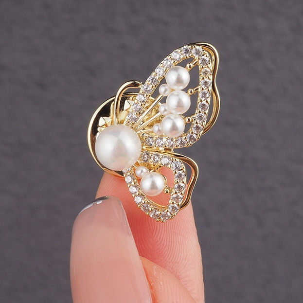 Flying butterfly brooch