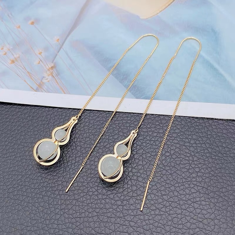High-end tassel gourd-shaped earrings, women's long chain earrings, Japanese and Korean internet-famous fashionable and individual cat's eye stone earrings