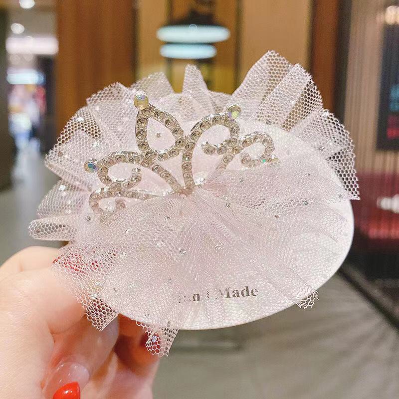 Short, light pink crown clamp