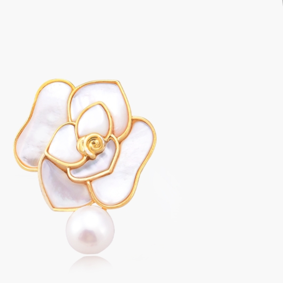 White floral brooch with hanging tip