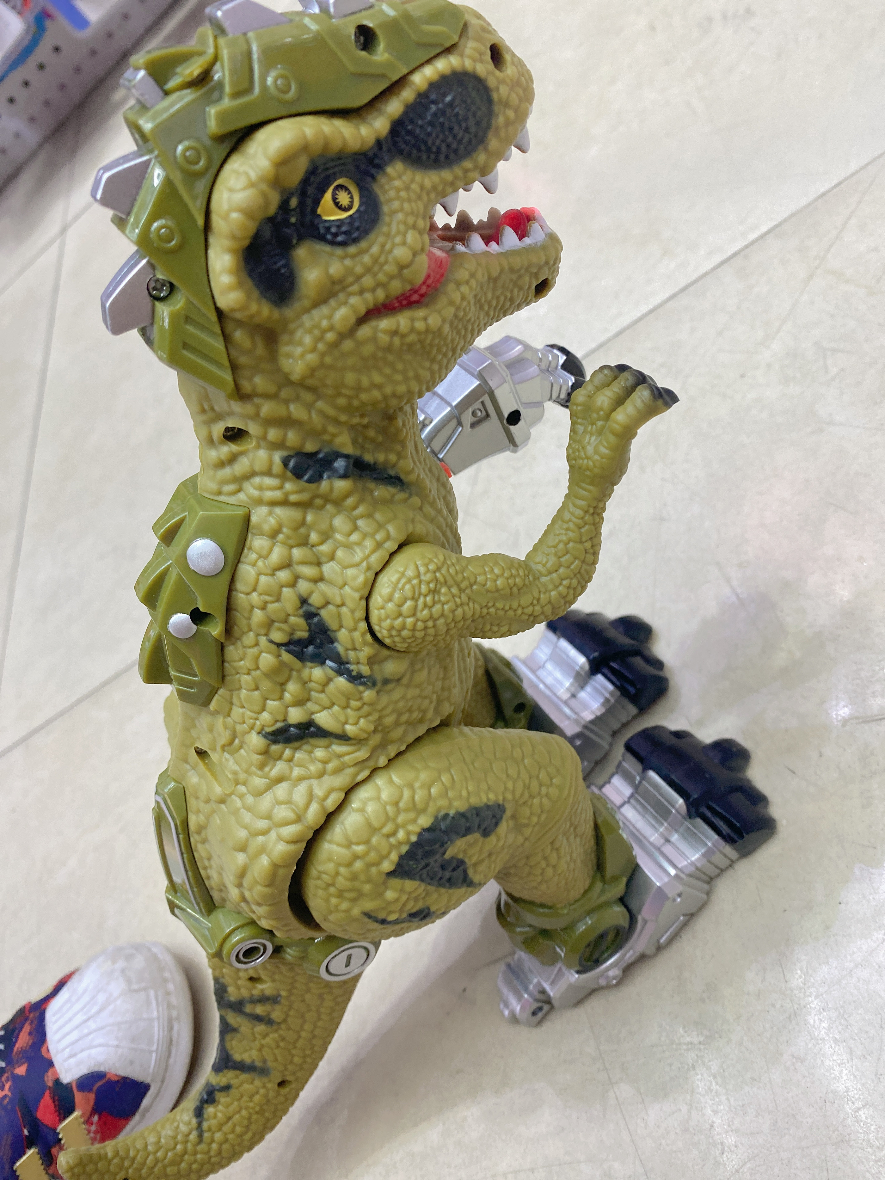 The electric dinosaur emits smoke and manually launches missiles detail image 1