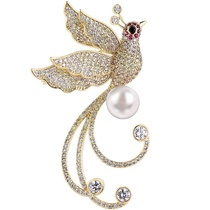 A hundred birds brooch
