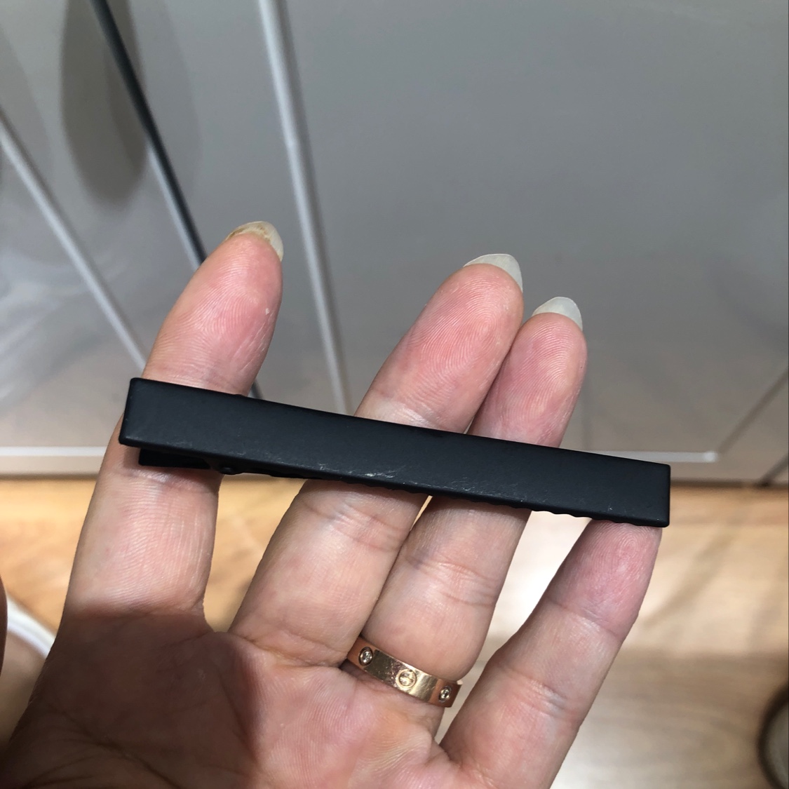 8 centimeters wide, matte black
