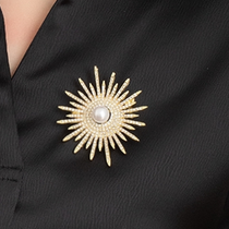 Radiant pearl brooch