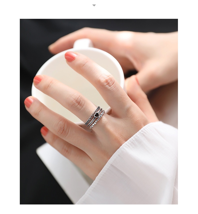 A Korean version of a wide, distinctive, thick and smooth open index finger ring with a twist pattern detail image 2