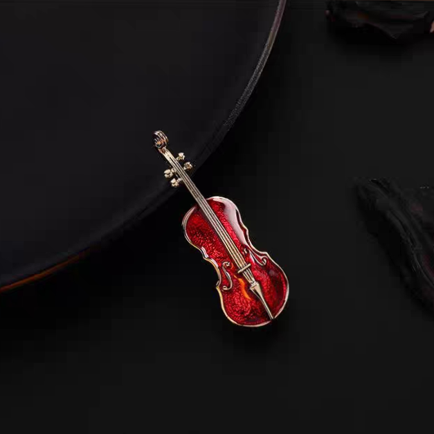 Red violin brooch