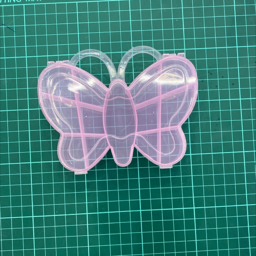 Pink butterfly in the box