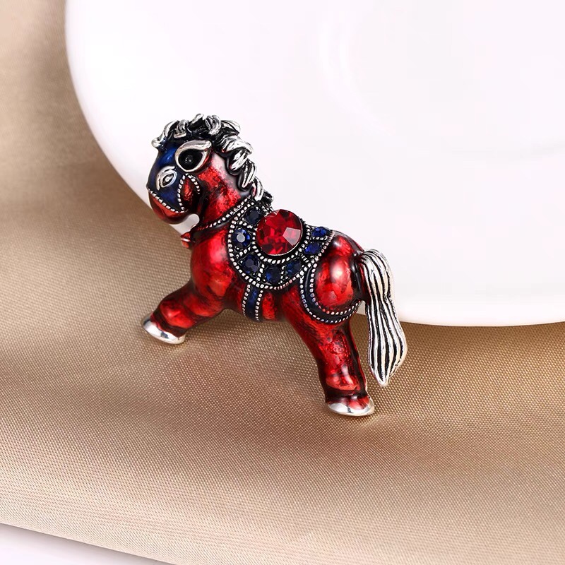 Pony brooch