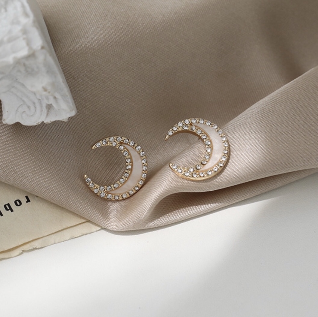 Fashion personality Moon left and right side simple delicate trend small stud earrings