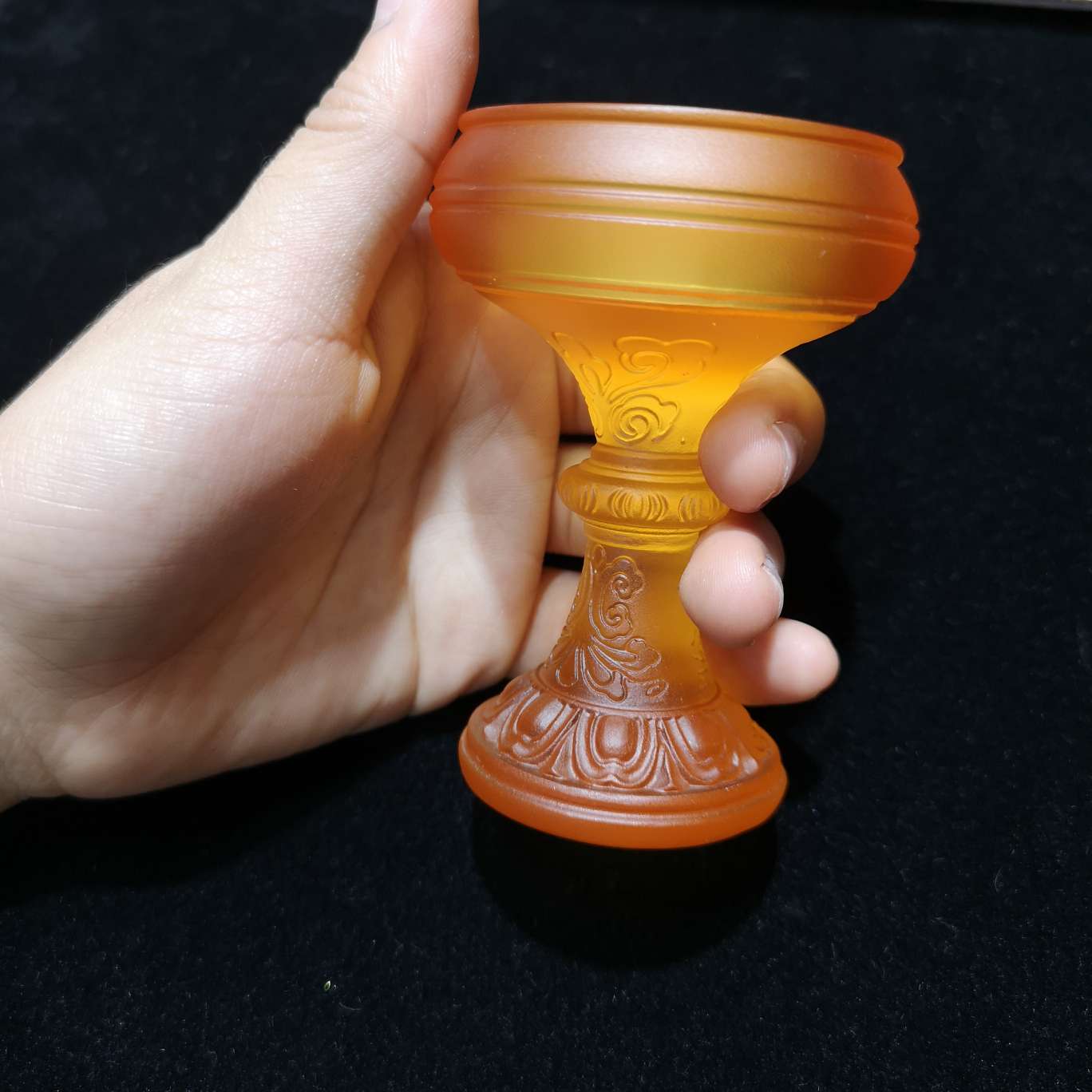 A glass amber candlestick Specification image
