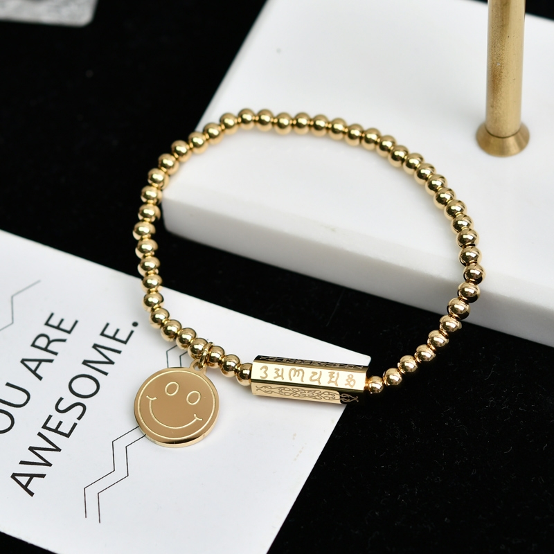 The Japanese and Korean smiley face round bead elastic bracelet is the same style as the female fashion Internet celebrity. It is versatile, unique and trendy Item Picture