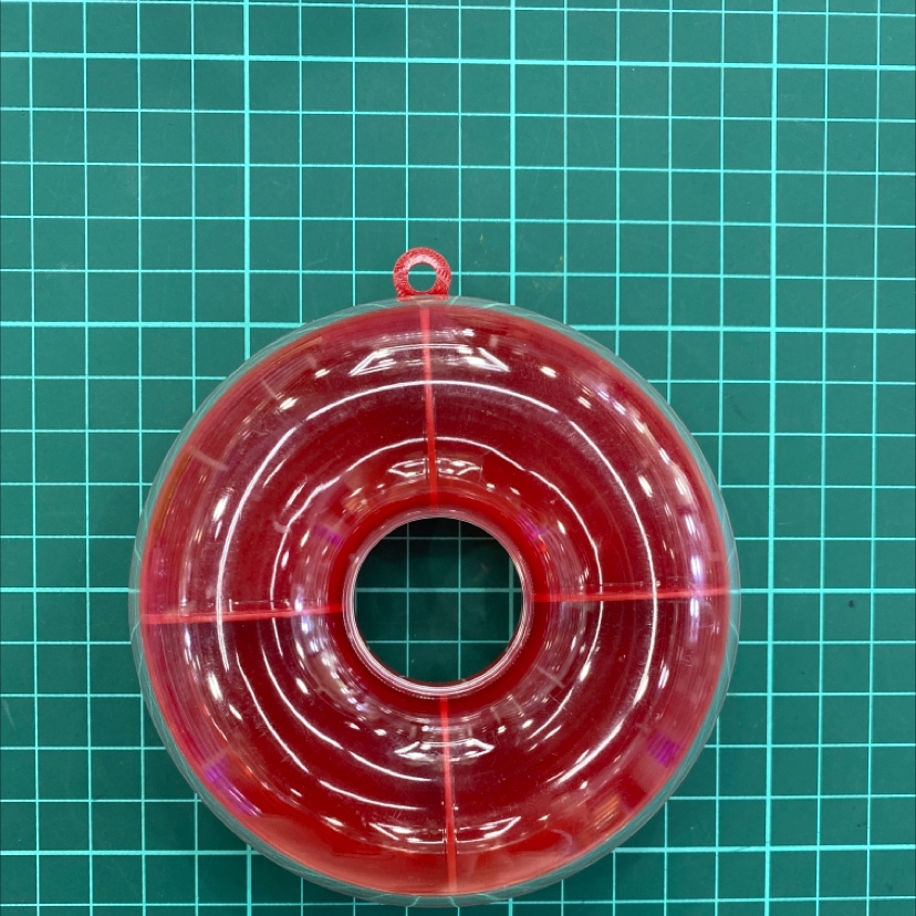 Doughnuts with big red bottom in the box