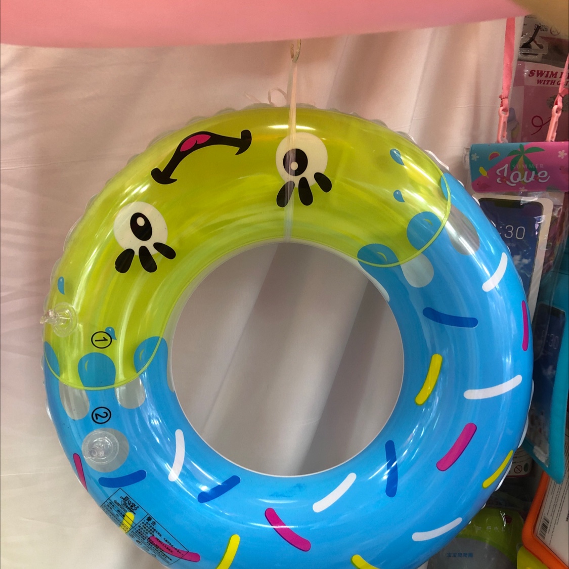 Smiling face swimming ring