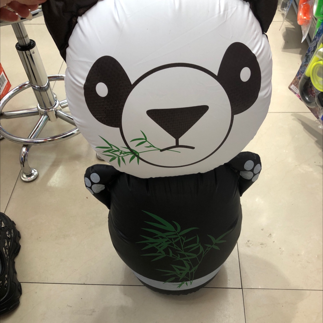 The panda doesn't reach the jar.
