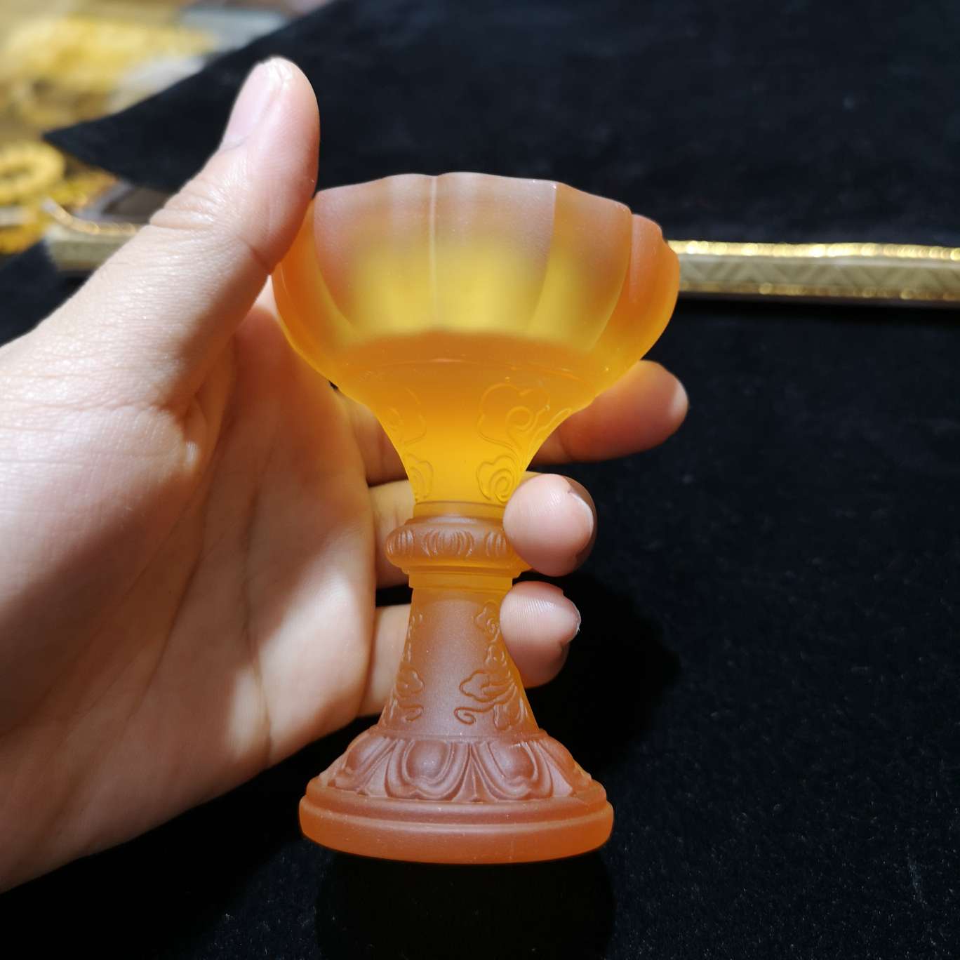 A glass amber candlestick Item Picture